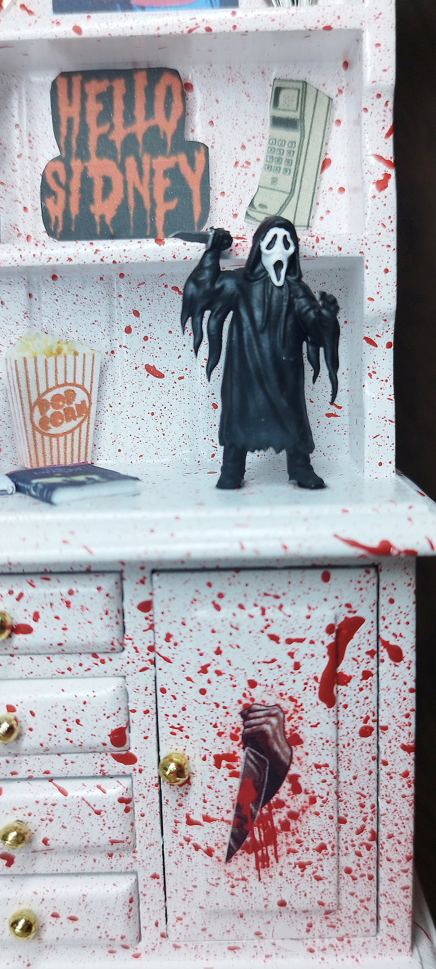 Ghost face miniature cabinet