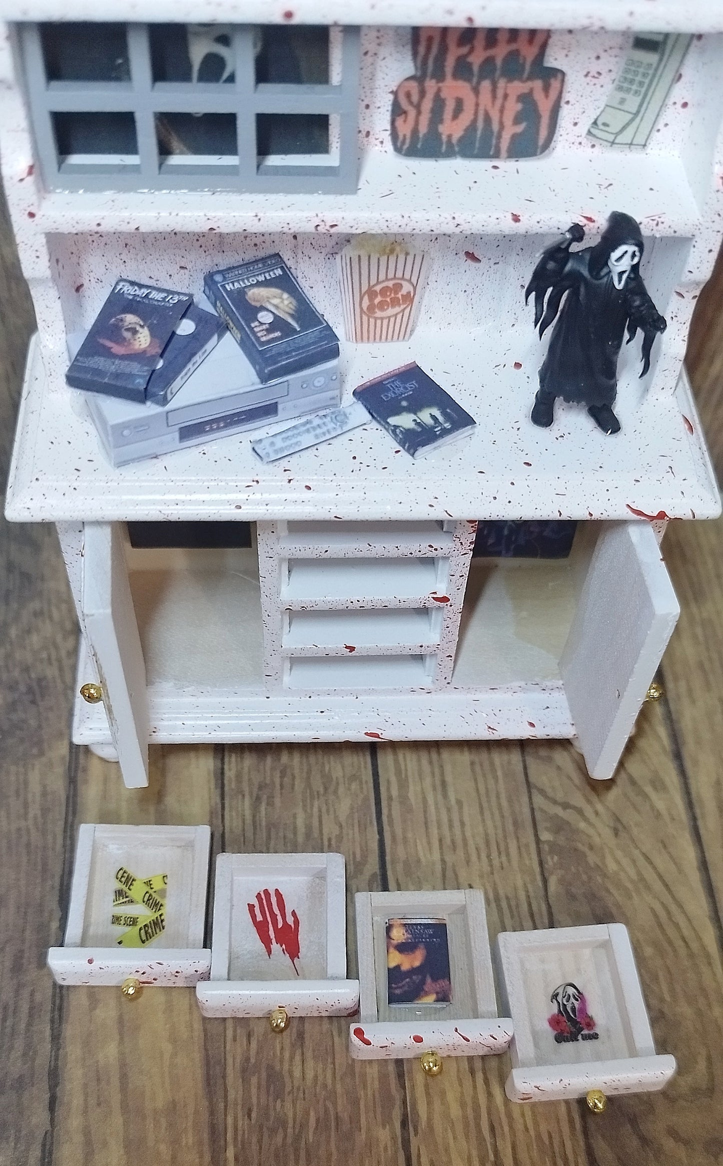 Ghost face miniature cabinet